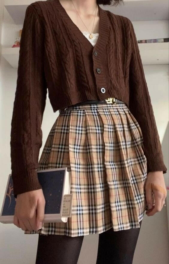 Dark Academia style mystery box containing clothes and accessories for a sophisticated, vintage-inspired look