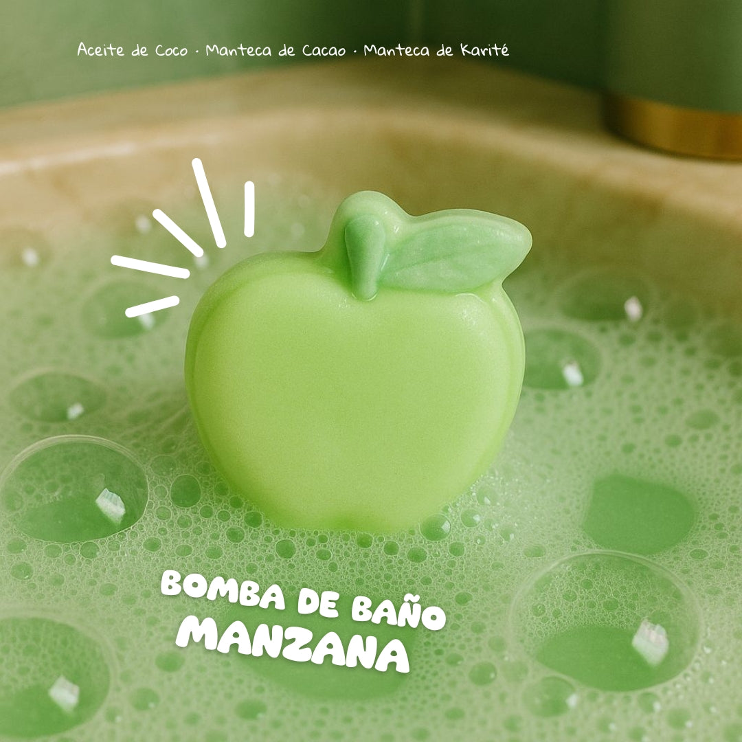 Green apple-shaped bath bomb in a green bath with bubbles, labeled 'Bomba de Baño Manzana'.