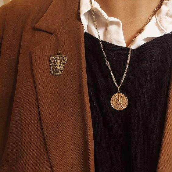 Dark Academia style mystery box containing clothes and accessories for a sophisticated, vintage-inspired look