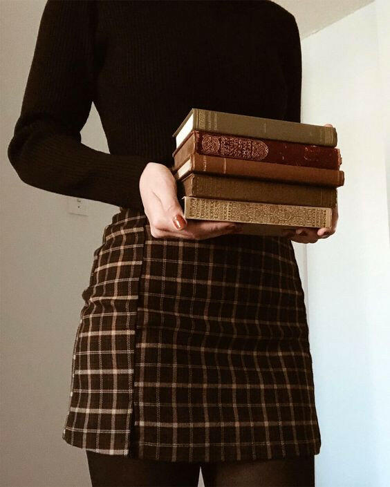 Dark Academia style mystery box containing clothes and accessories for a sophisticated, vintage-inspired look