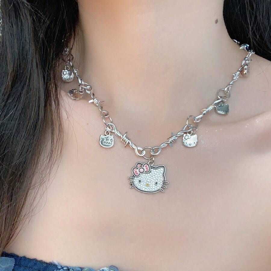 Necklace with Hello Kitty charm worn by a person