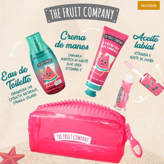 Collection of 'The Fruit Company' products including a pink pouch, hand cream, lip balm, and other items on a beige background.