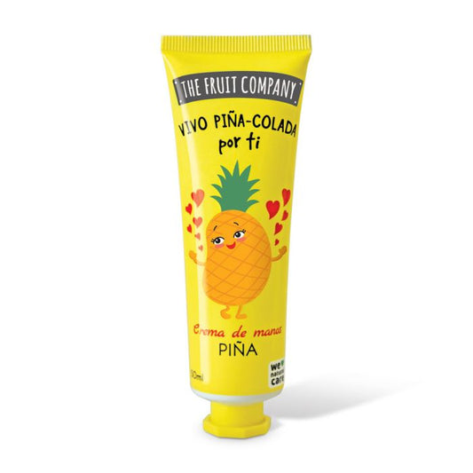 Hand cream tube with pineapple design and 'The Fruit Company' branding on a white background