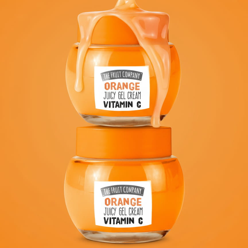 Two jars of 'Orange Juicy Gel Cream Vitamin C' on an orange background