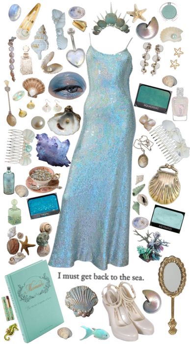 A collage-style product presentation centered on a sleeveless iridescent light blue maxi dress, surrounded by seashell and beach-themed accessories including a tiara, earrings, sandals, a mirror, perfume bottles, and a turquoise book, with the text 'I must get back to the sea.'.