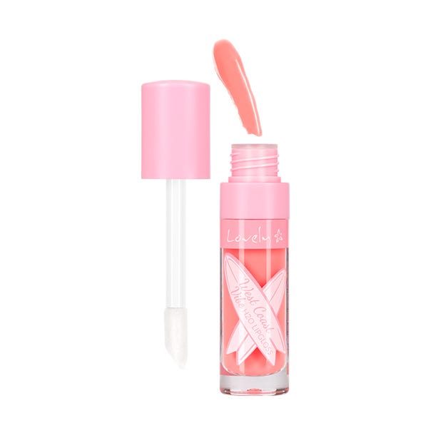 Pink lip gloss with applicator on a white background