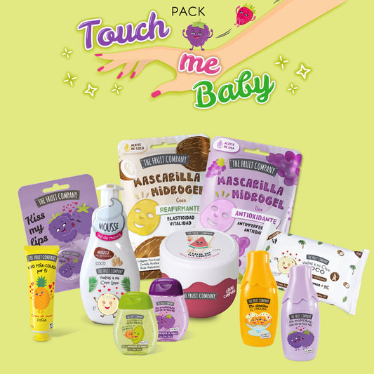 Collection of care products with 'Touch me Baby' branding on a green background
