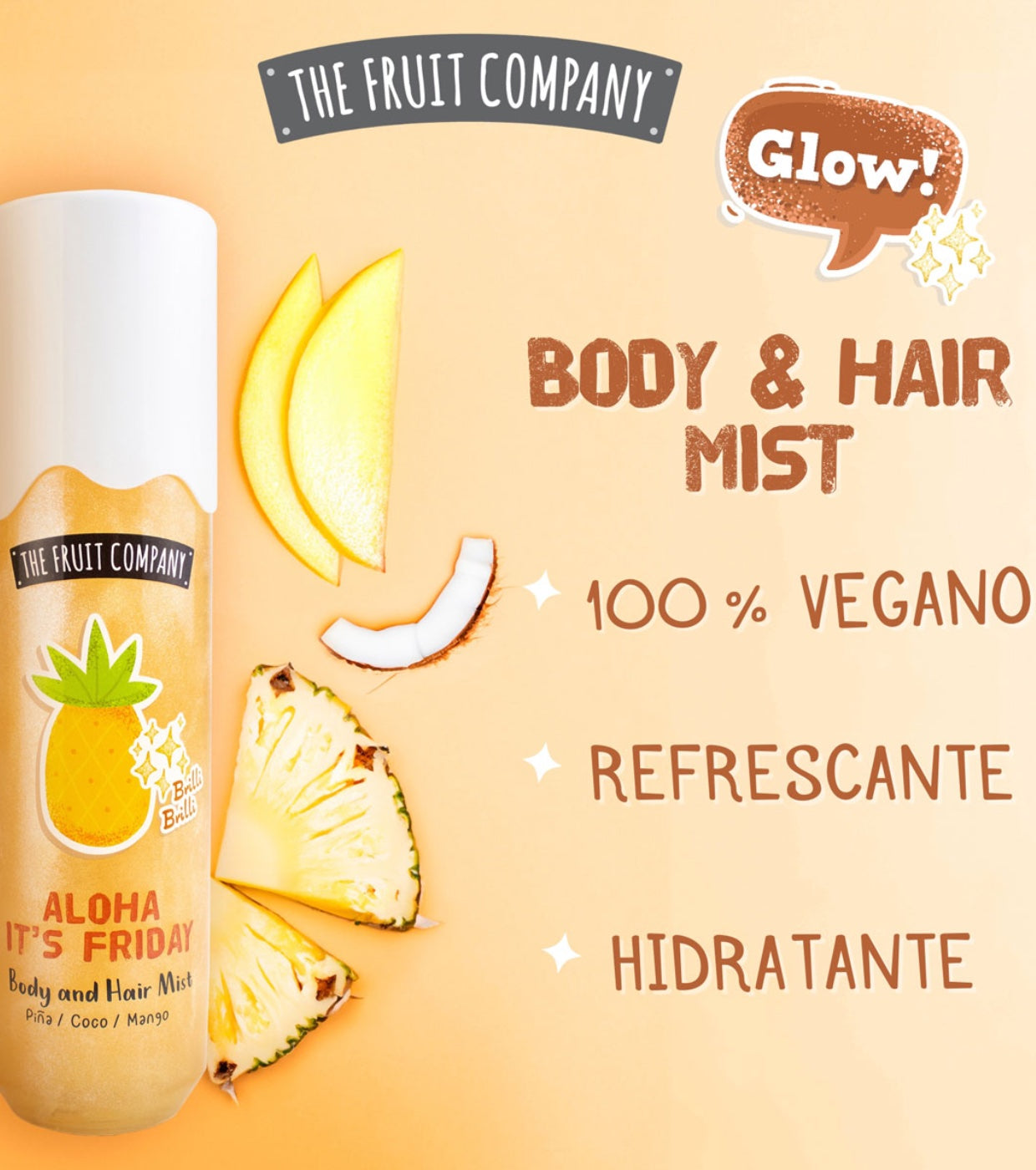 Body and hair mist bottle with pineapple slices on a peach background, featuring 'The Fruit Company' branding.